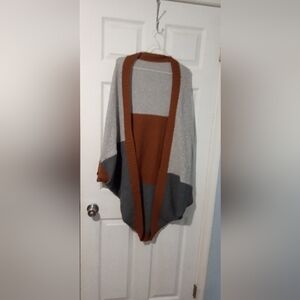 Brown and Gray shrug, unknown source.